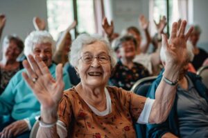 Family members greeting a senior resident in a bright assisted living common room, sharing conversation and smiles.